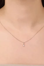 Minimal ve Baget Taşlı Çubuklu Toplu Kolye 3 Minimal ve Baget Taşlı Çubuklu Toplu Kolye, 14 Ayar Altın, Sarı renk, 1.44 g, detay görünümü